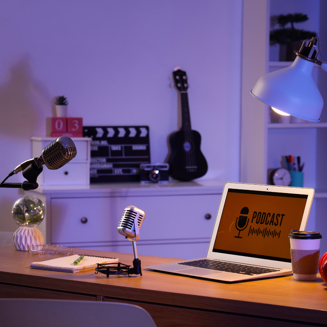 • writing podcast titles in notebook • planning podcast episode ideas • content creator brainstorming titles • podcast content strategy planning