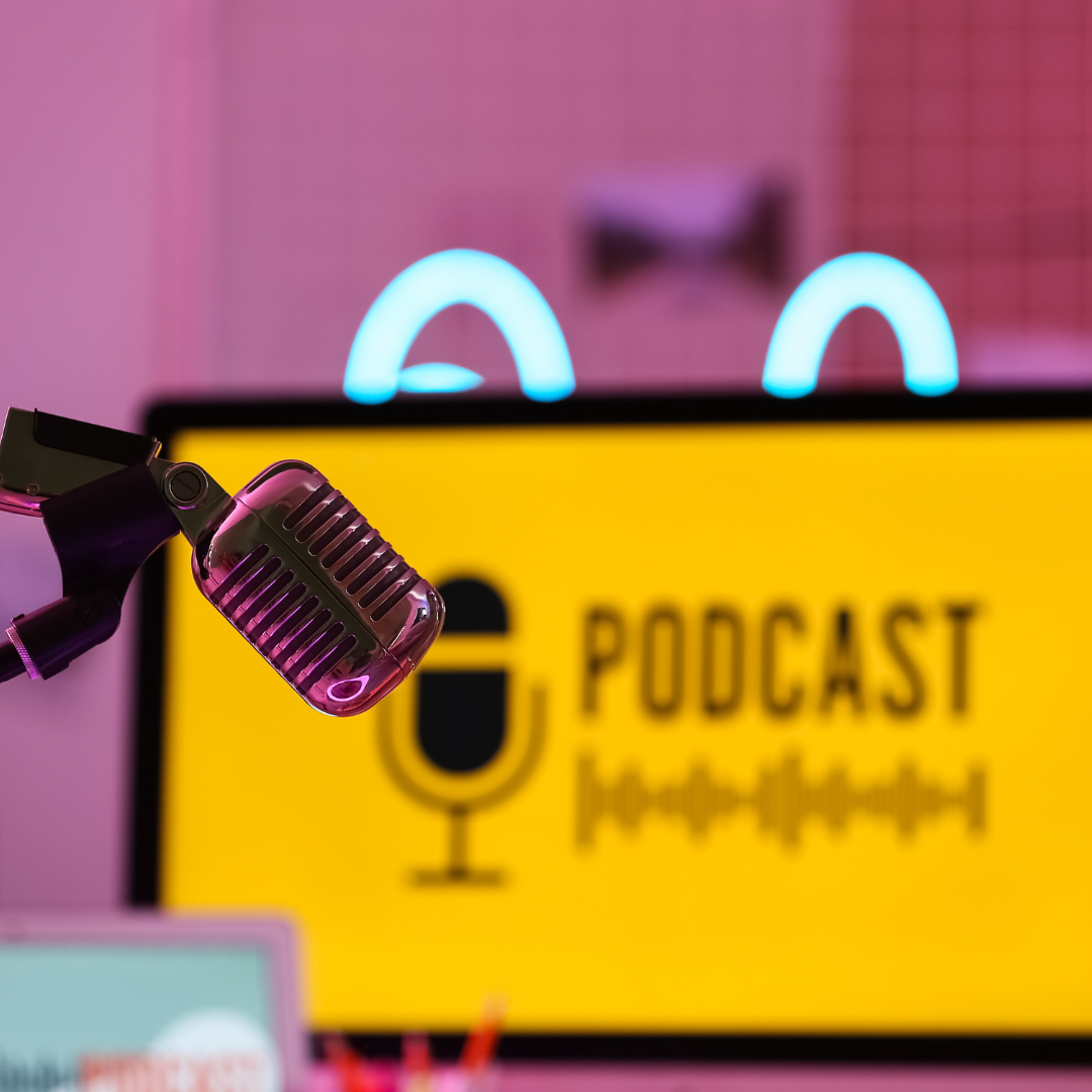 • planning podcast content calendar • entrepreneur organizing podcast episodes • podcast workflow planning desk • content calendar notebook with microphone